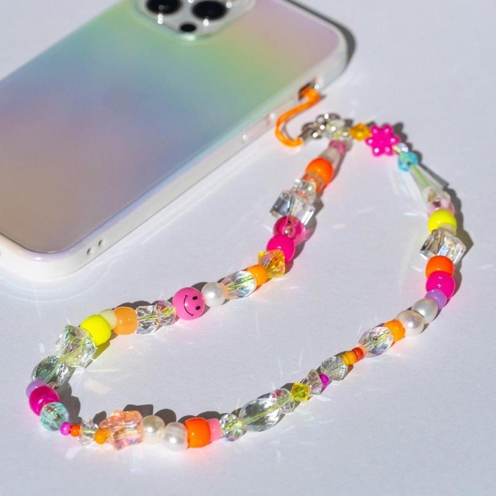 Hand made, one of a kind y2k beaded cell phone sun catcher charm.